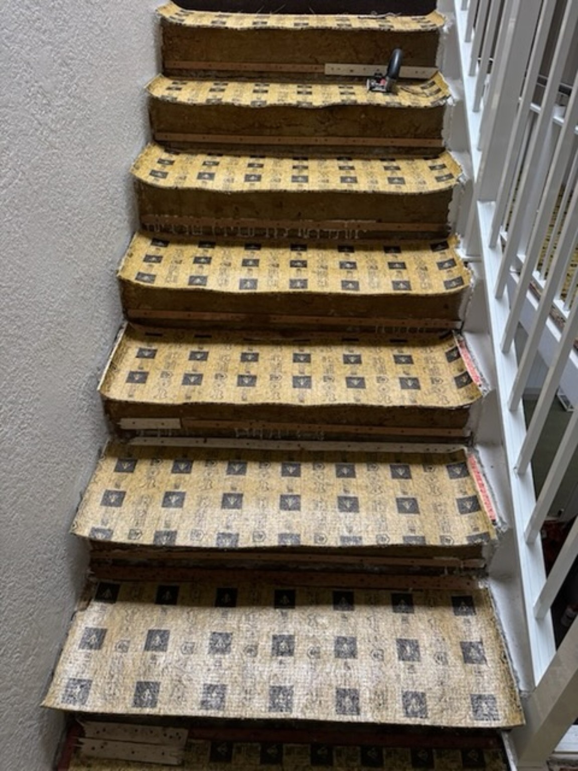 Patterned stair carpet before replacement